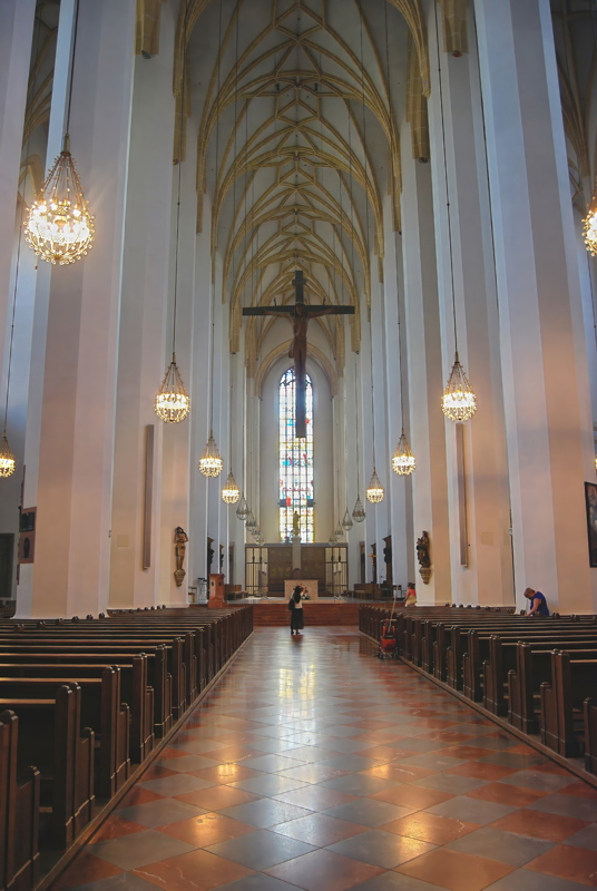 The interior of the iconic Frauenkirche (Cathedral of Our Blessed Lady) in Munich, Germany, looking down the central nave toward the altar